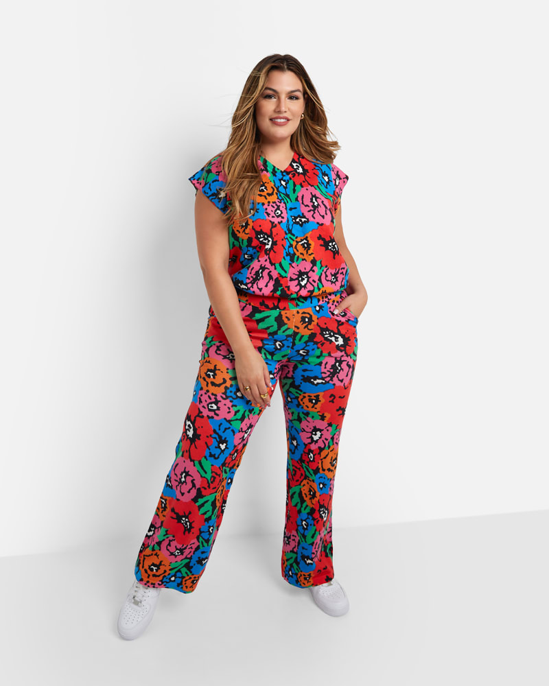 Front of a model wearing a size 2X Rikki Knit Floral Print Wide Leg Pants W. Pockets in Multicolor by Rebdolls. | dia_product_style_image_id:324378